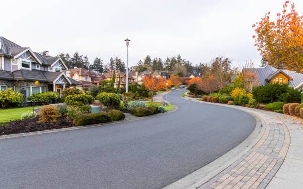 Upscale residential street with homes in Victoria, BC